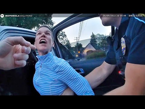 Angry Karen With a Warrant Tries to Bite Officer